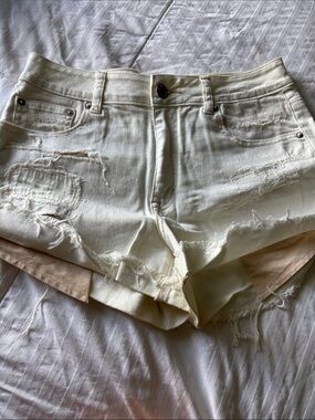 American Eagle Outfitters Cream Distressed Denim Shorts
